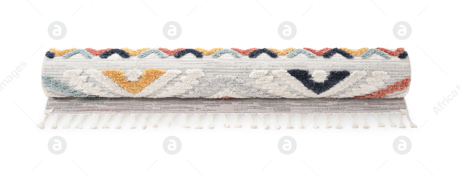 Photo of Rolled carpet with pattern on white background. Interior element