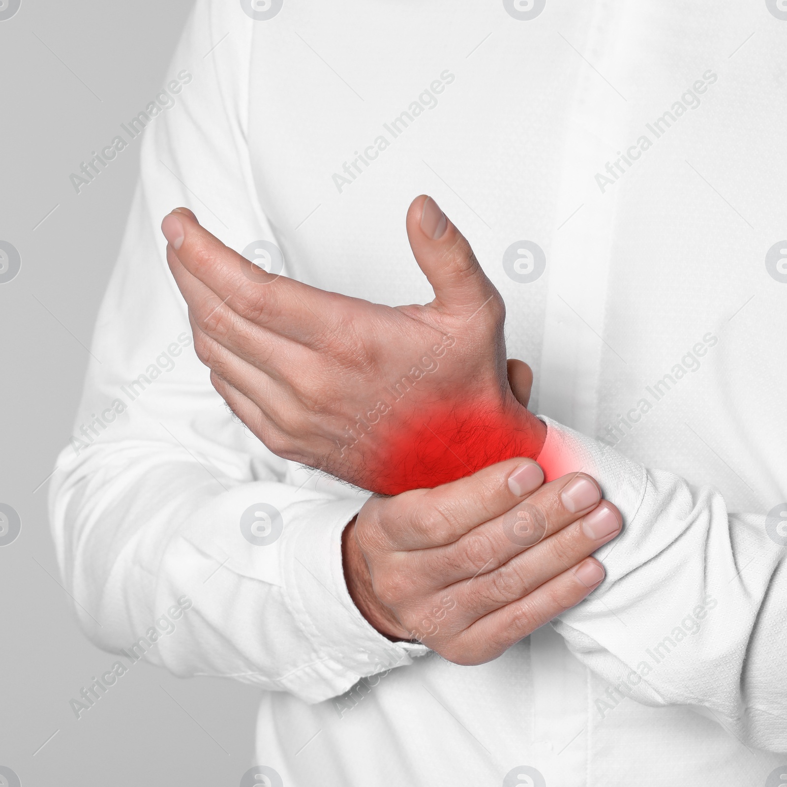 Image of Man suffering from rheumatism on light background, closeup