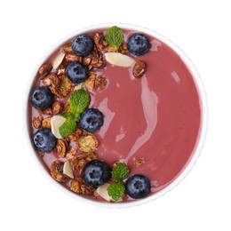 Photo of Bowl of delicious acai smoothie with fresh blueberries and granola isolated on white, top view