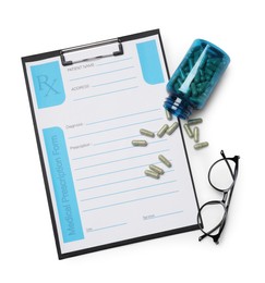 Photo of Clipboard with medical prescription form, pills and glasses on white background, top view