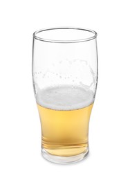 Photo of Half full glass of beer isolated on white