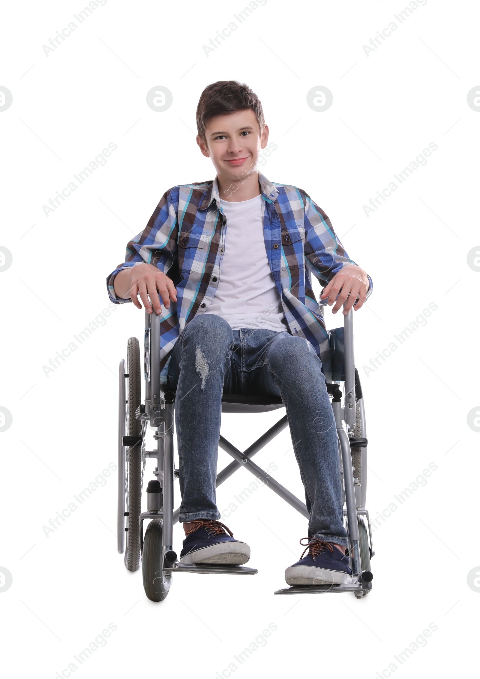 Photo of Teen boy in wheelchair on white background