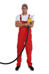 Photo of Gas station worker with fuel nozzle on white background