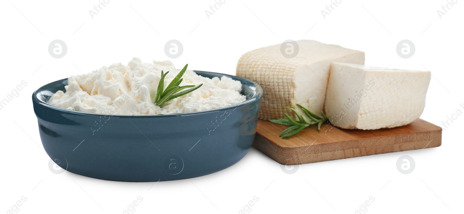 Photo of Different types of delicious tofu cheese with rosemary on white background