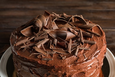 Tasty homemade chocolate cake on plate, closeup