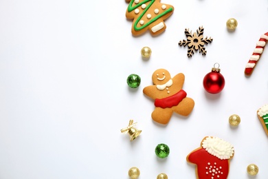 Flat lay composition with Christmas decorations on white background