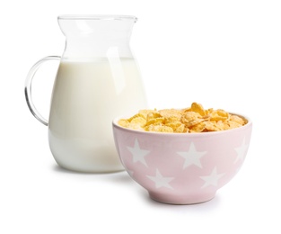 Photo of Bowl with crispy cornflakes and jug of milk on white background