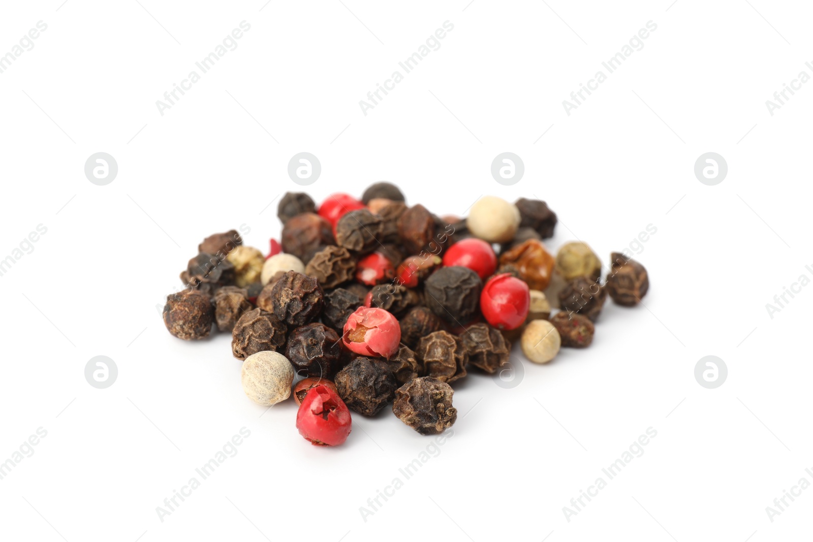 Photo of Mix of peppercorns on white background. Aromatic spice