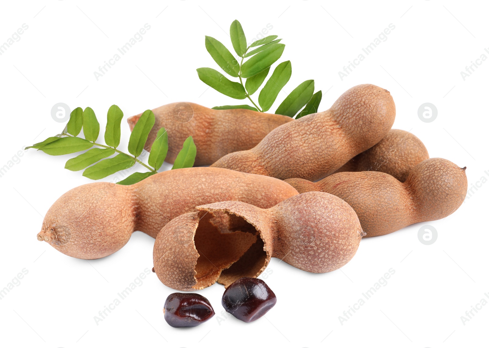 Image of Delicious ripe tamarinds on white background. Exotic fruit