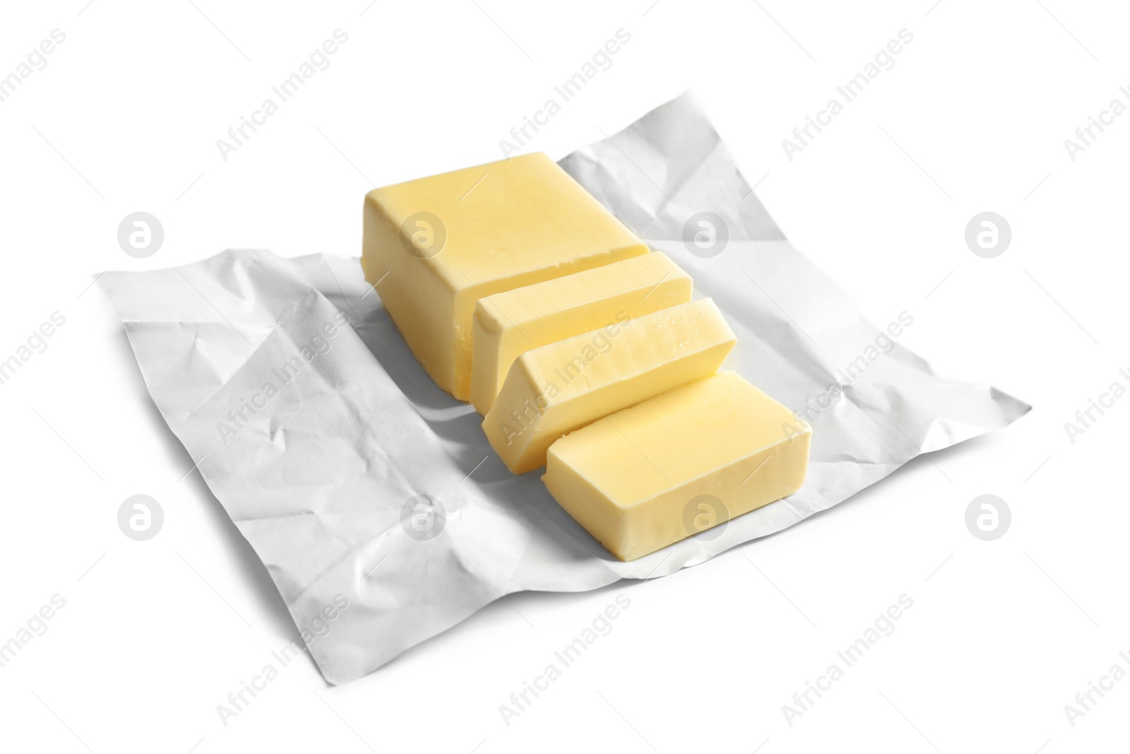 Photo of Cut block of fresh butter with wrapper on white background