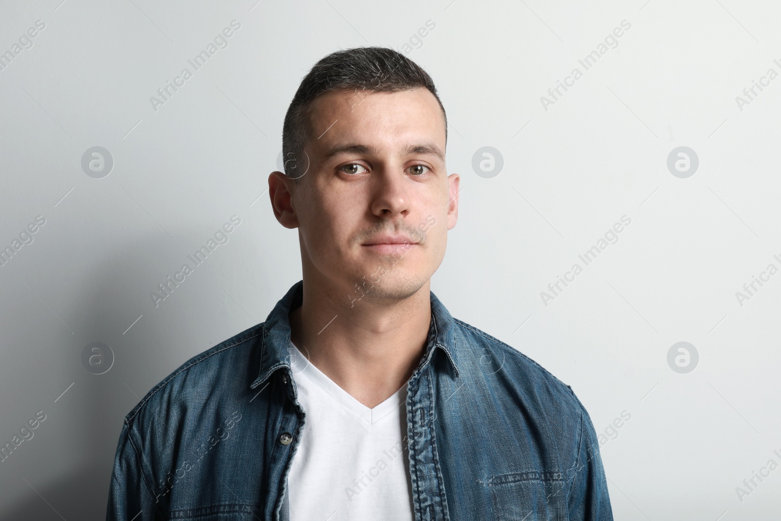 Photo of Portrait of handsome man on white background