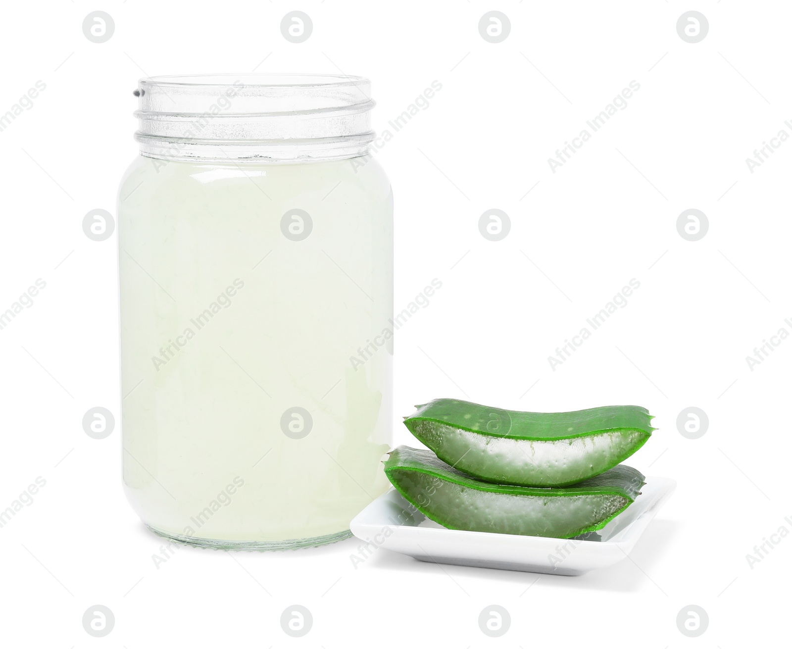 Photo of Fresh aloe juice in jar and cut leaves isolated on white