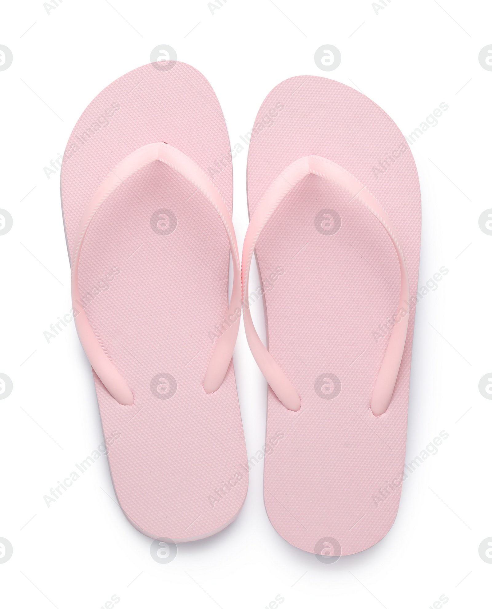 Photo of Stylish pink flip flops on white background, top view. Beach object