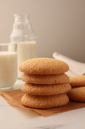 Photo of Delicious Danish butter cookies on white marble table, closeup