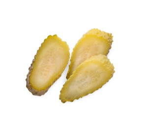 Photo of Slices of tasty pickled cucumber on white background, top view
