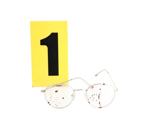Bloody glasses and crime scene marker with number 
one isolated on white