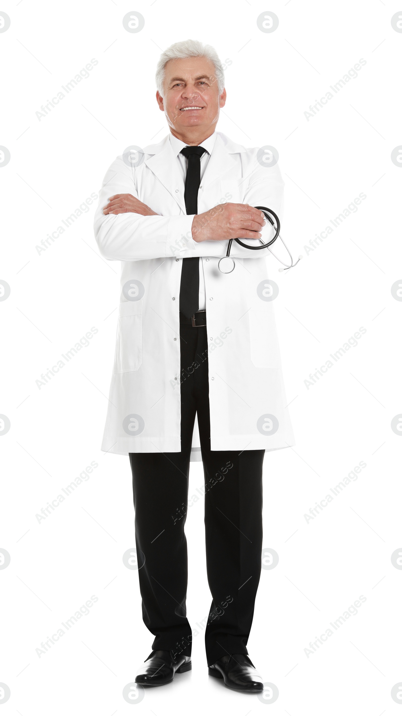 Photo of Full length portrait of male doctor with stethoscope isolated on white. Medical staff