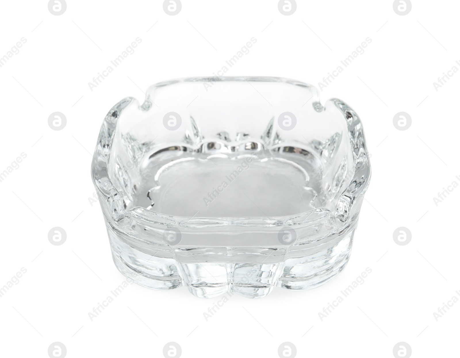 Photo of One empty glass ashtray isolated on white