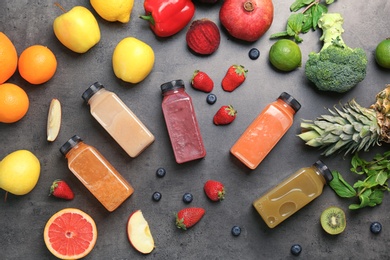 Photo of Flat lay composition with healthy detox smoothies and ingredients on grey background