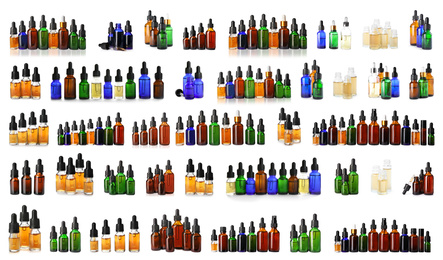 Image of Set with bottles of different essential oils on white background