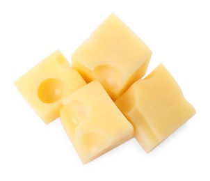 Photo of Cubes of delicious cheese isolated on white