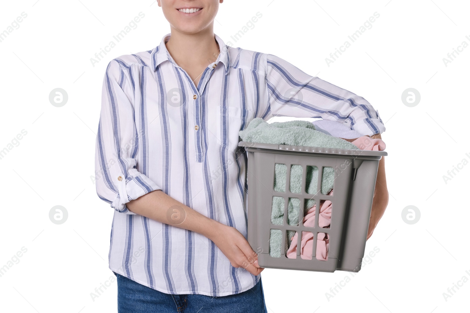 Photo of Woman with basket full of clean laundry on white background, closeup