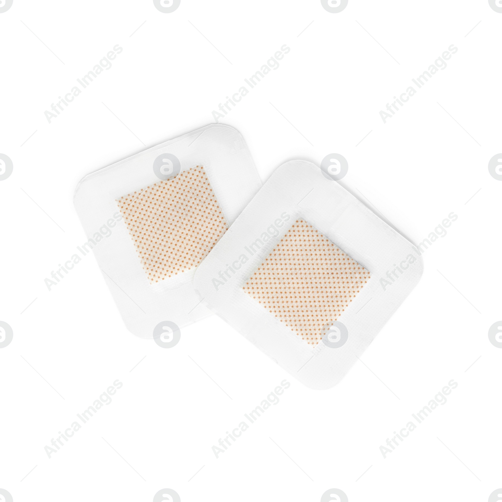 Medical sticking plasters isolated on white. First aid item Photo of Medical sticking plasters isolated on white. First aid item