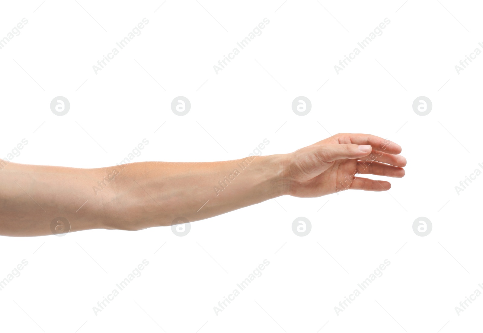 Photo of Young man held out hand on white background, closeup