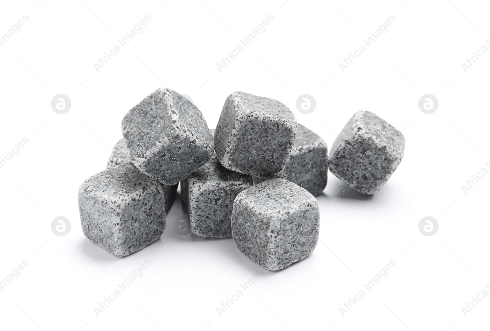 Photo of Classic grey whiskey stones on white background