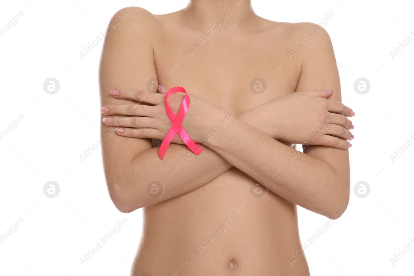 Photo of Naked woman with pink ribbon on white background, closeup. Breast cancer awareness