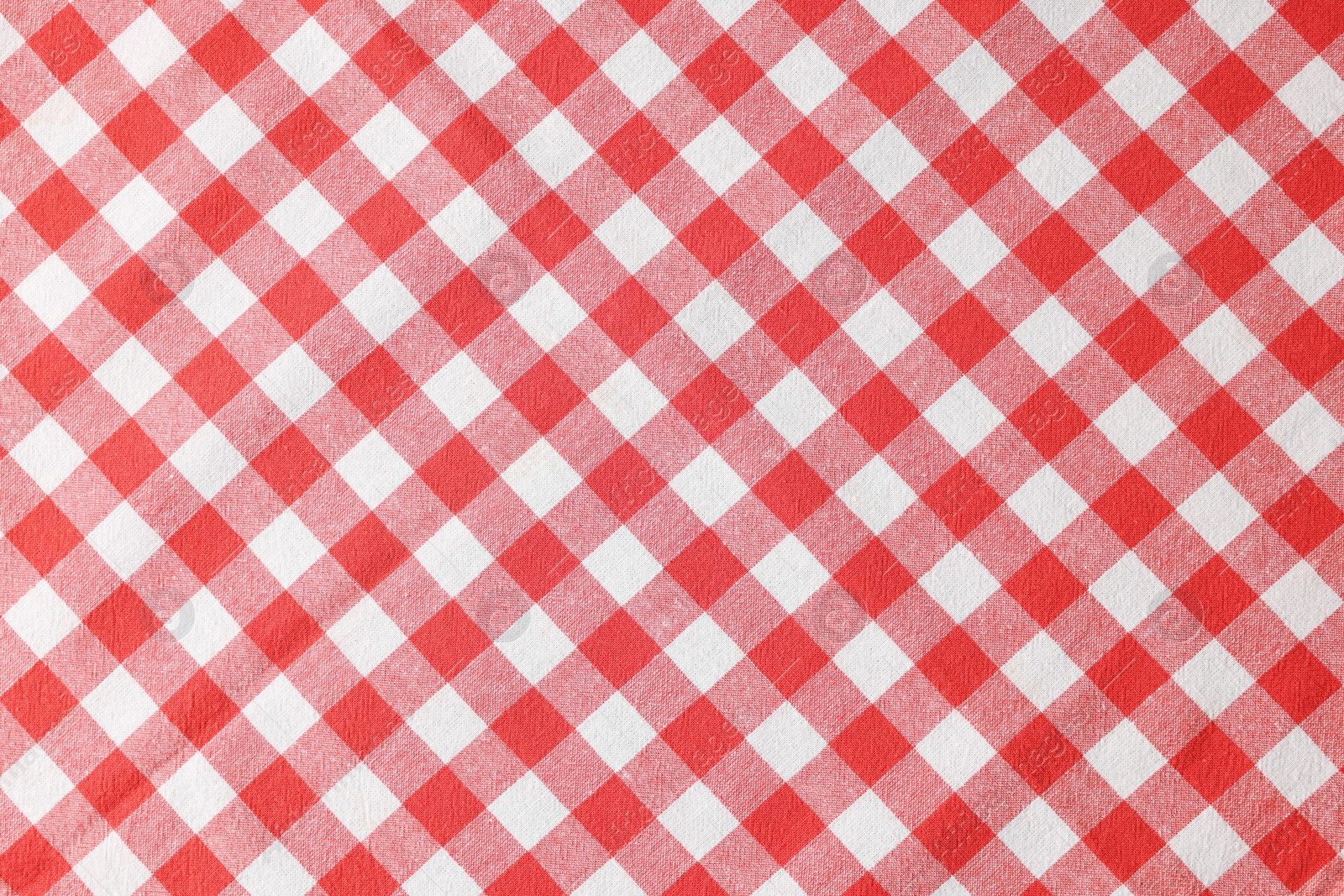 Photo of Red checkered tablecloth as background, top view