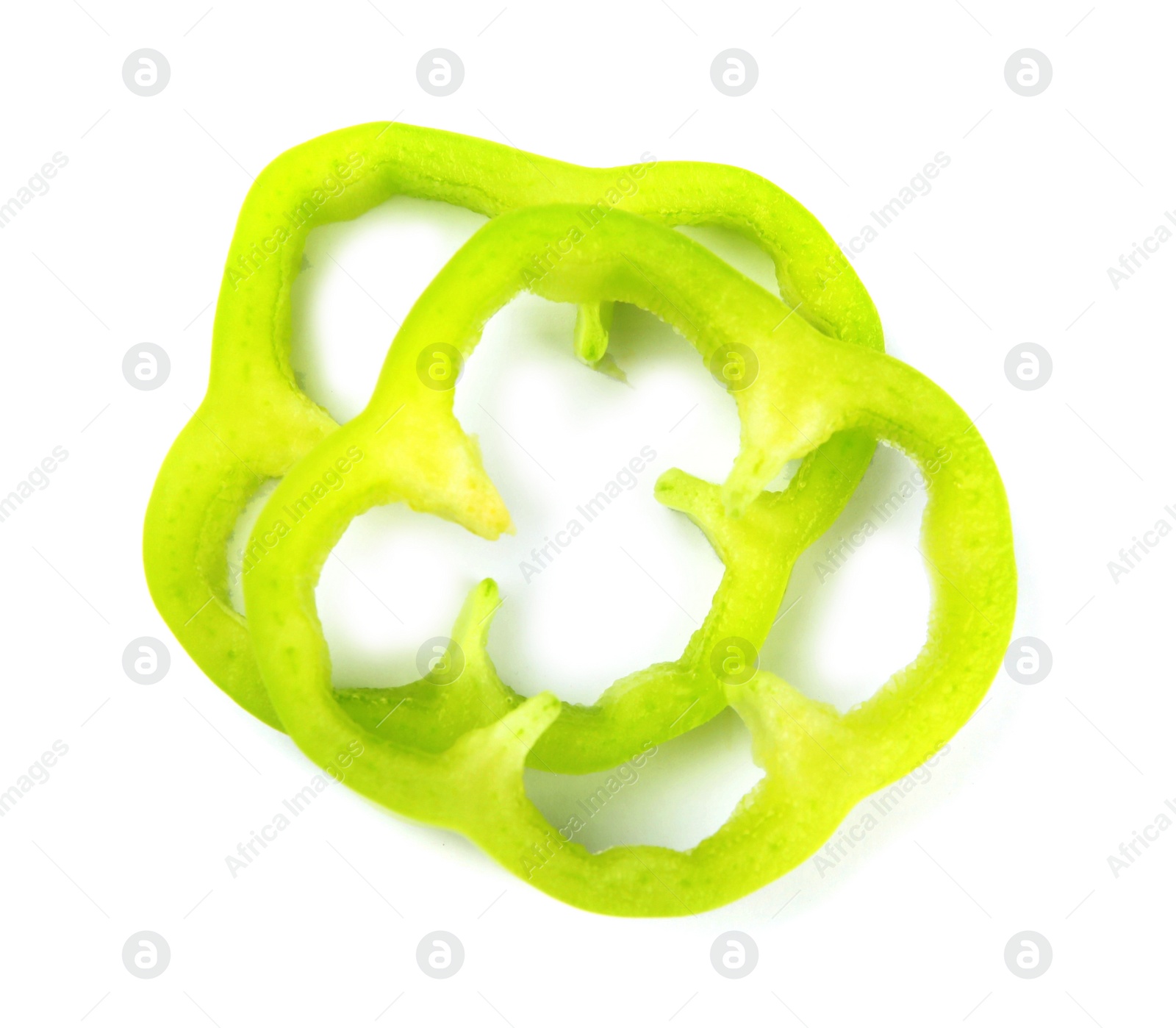 Photo of Rings of green bell pepper on white background, top view