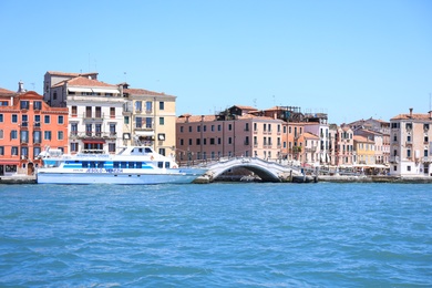Photo of VENICE, ITALY - JUNE 13, 2019: Picturesque view of city on sea shore