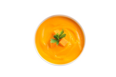 Photo of Delicious pumpkin cream soup in bowl on white background, top view