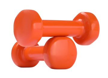 Photo of Orange dumbbells isolated on white. Sports equipment
