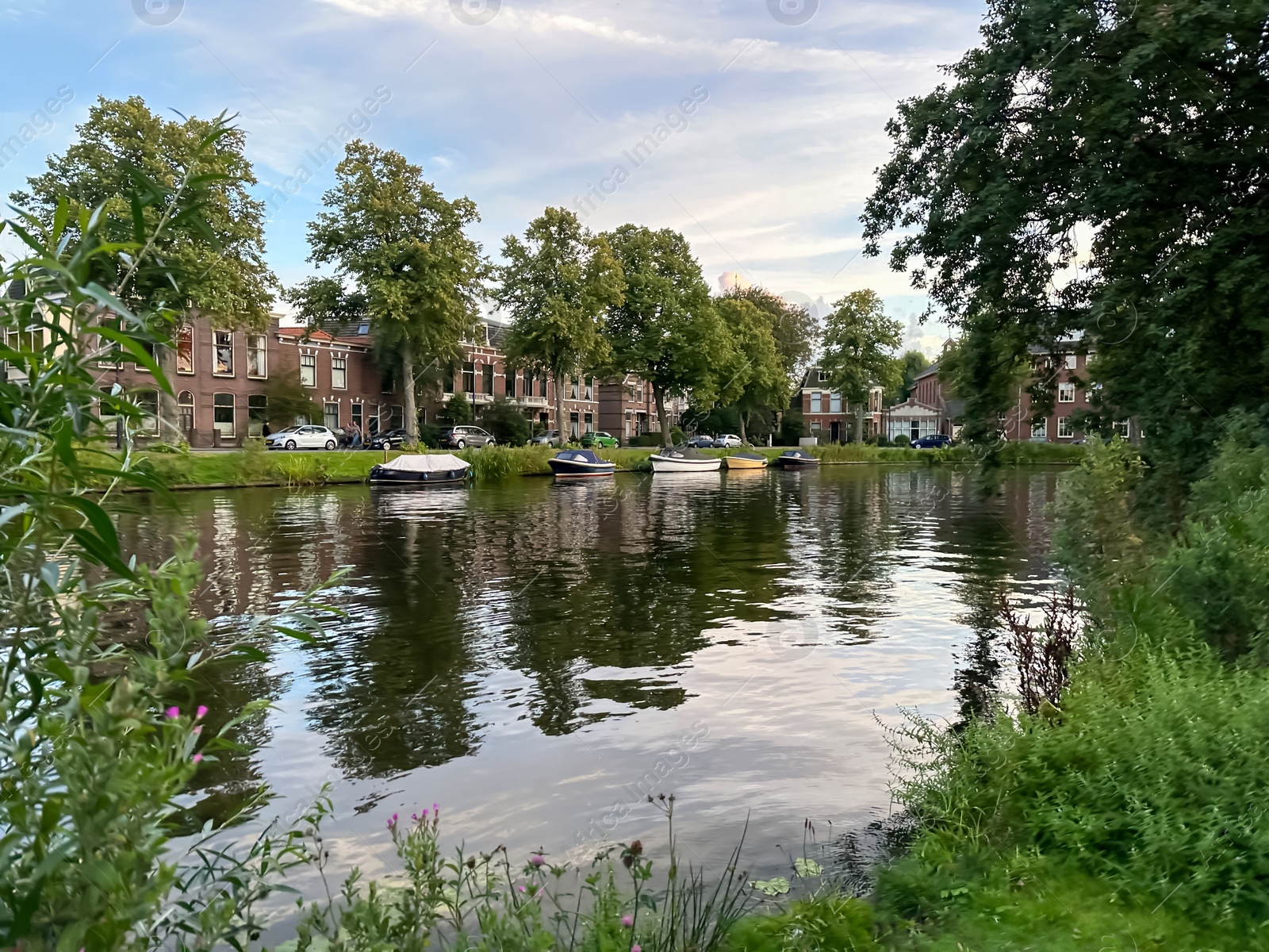 Photo of Beautiful view of canal with moored boats outdoors