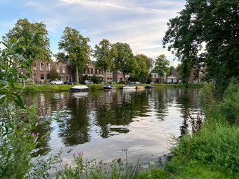 Beautiful view of canal with moored boats outdoors