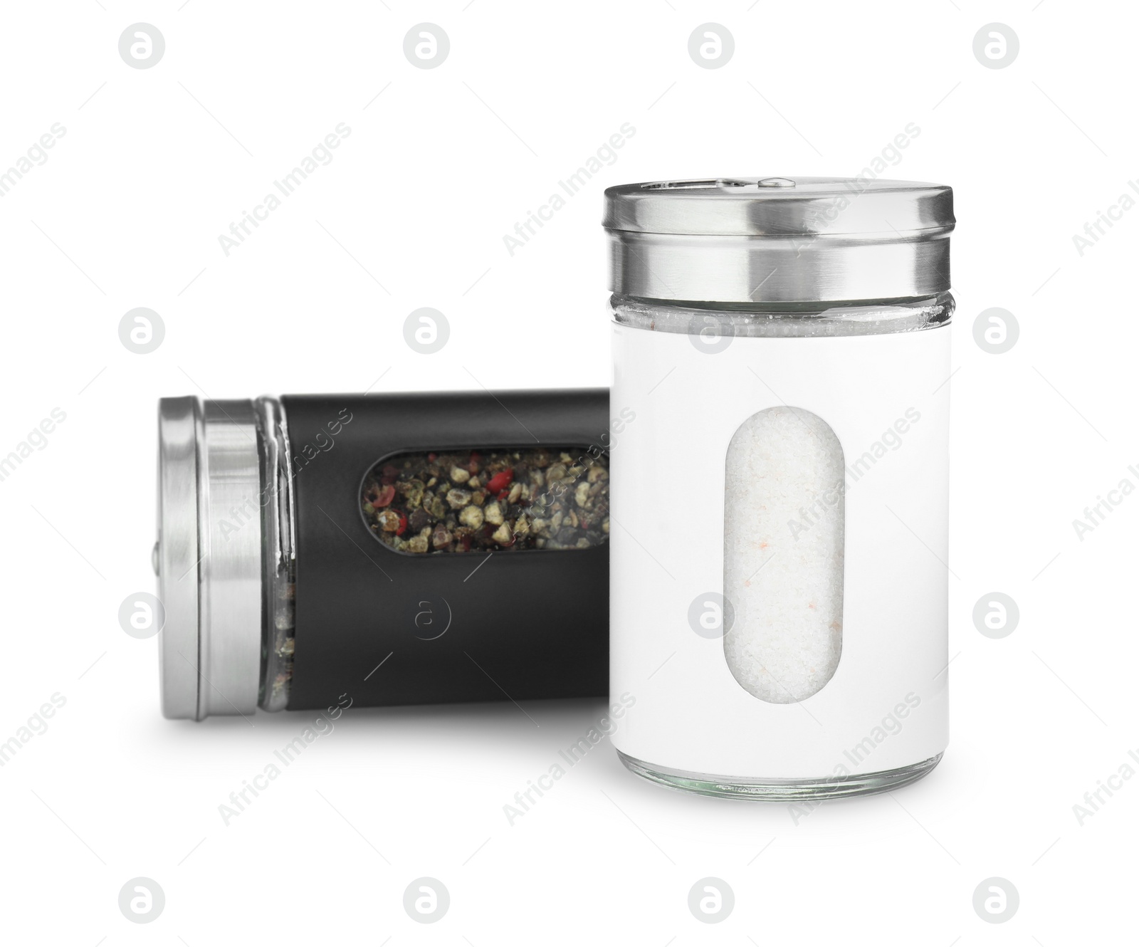 Photo of Salt and pepper shakers isolated on white