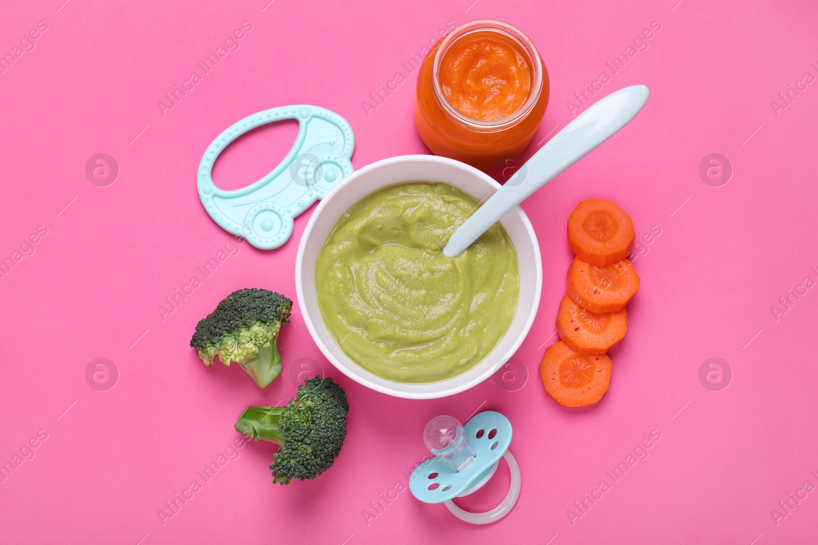 Photo of Flat lay composition with healthy baby food on pink background