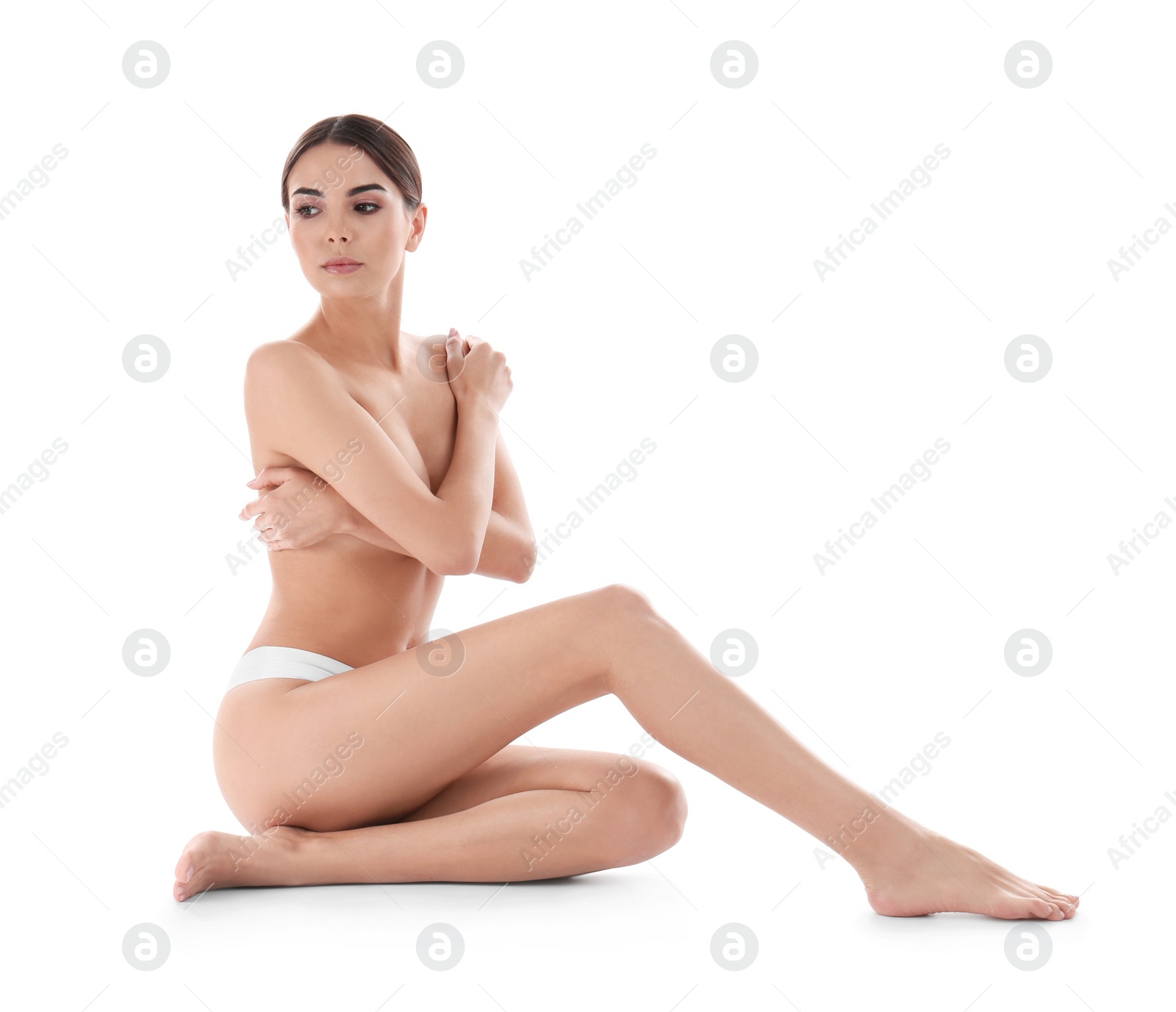 Photo of Young woman with perfect smooth skin on white background. Beauty and body care