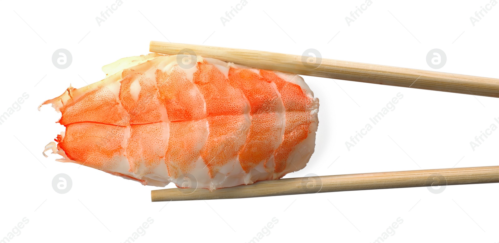 Photo of Chopsticks with delicious nigiri sushi isolated on white, top view