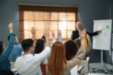 Image of Blurred view of seminar in modern office