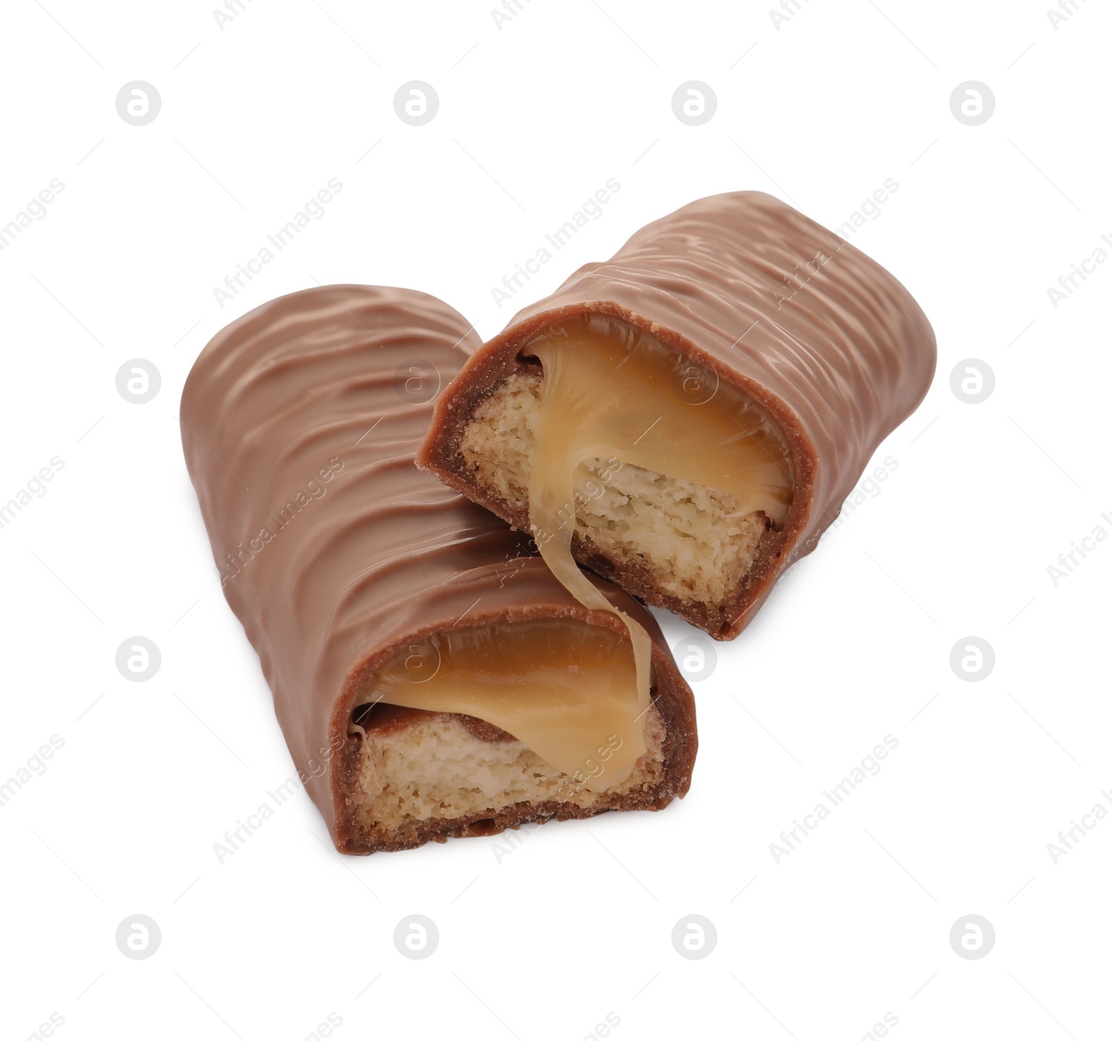 Photo of Pieces of chocolate bar with caramel on white background