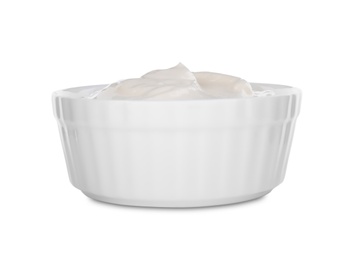 Photo of Bowl with sour cream isolated on white