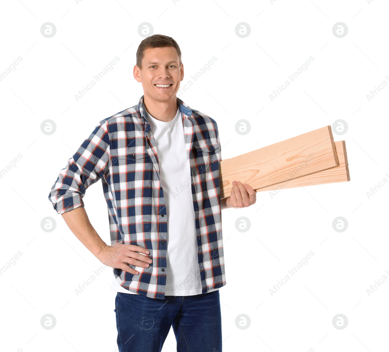 Photo of Handsome carpenter with wooden planks isolated on white