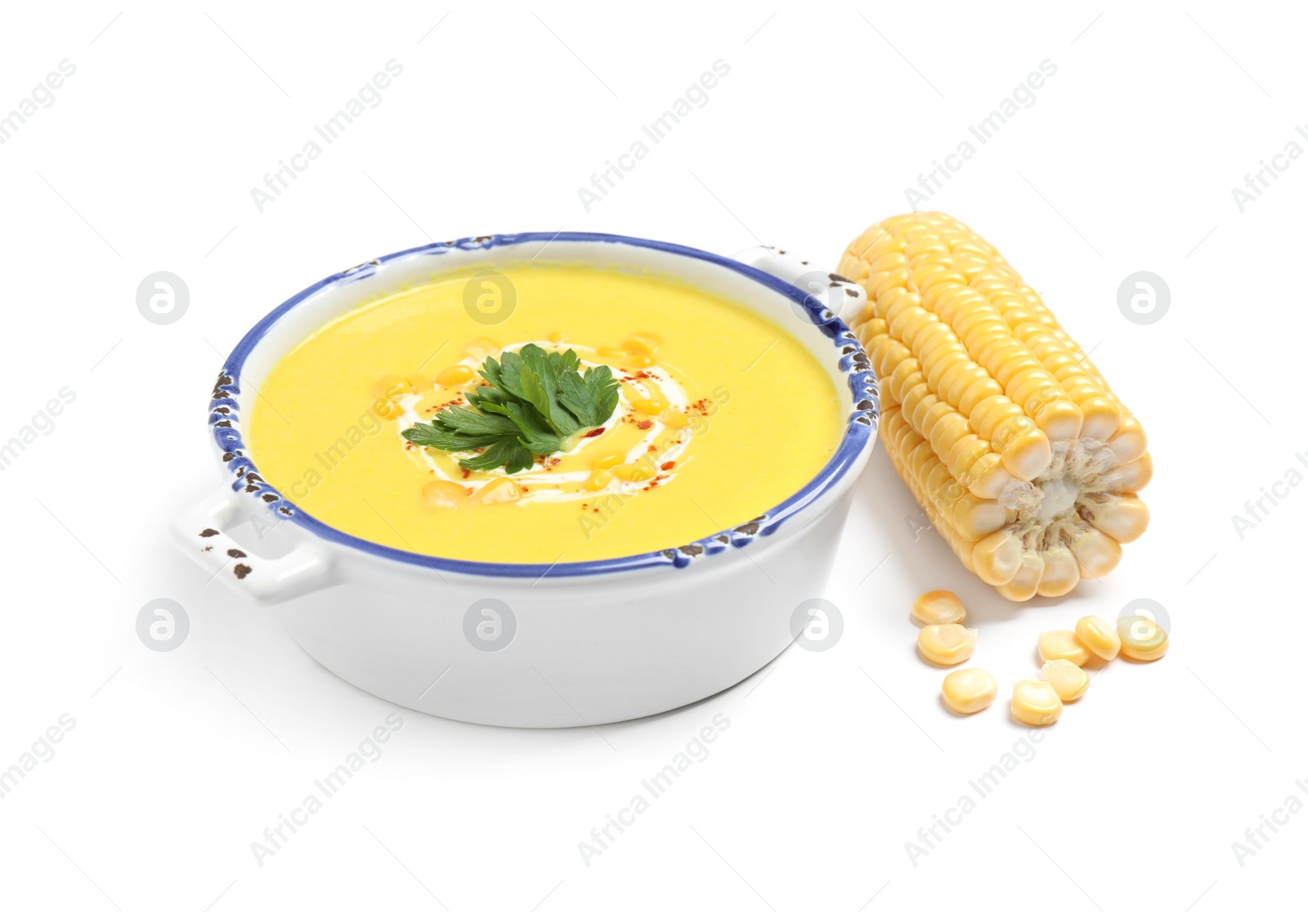 Photo of Delicious creamy corn soup and cob isolated on white