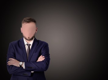 Image of Anonymous. Faceless man in suit on dark background, space for text