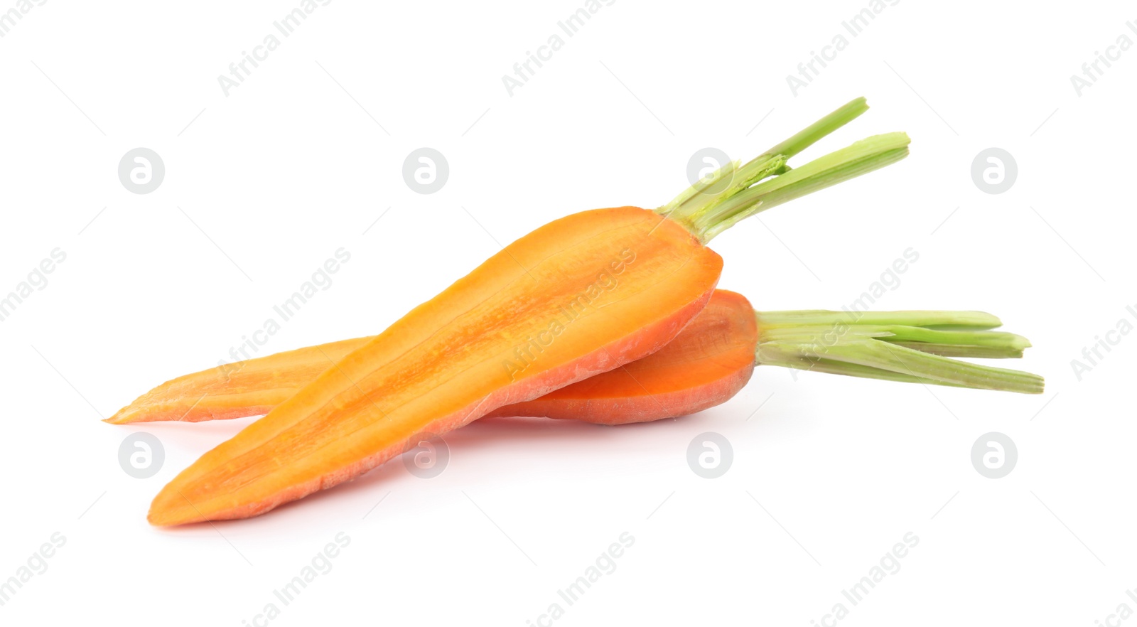 Photo of Halves of fresh ripe carrot isolated on white