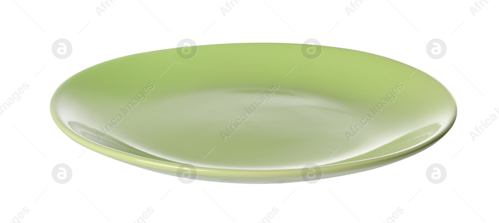 Photo of One green ceramic plate isolated on white