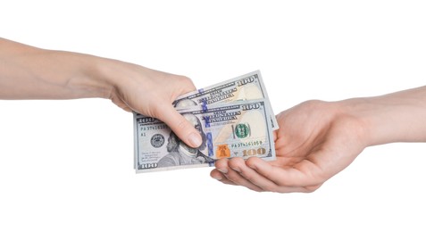 Photo of Money exchange. Man giving dollar banknotes to woman on white background, closeup